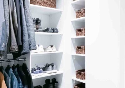 Organized closet for hanging jackets and shoes