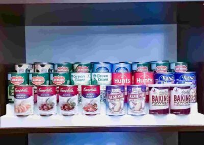 organized canned goods and glass jars for easy visibility